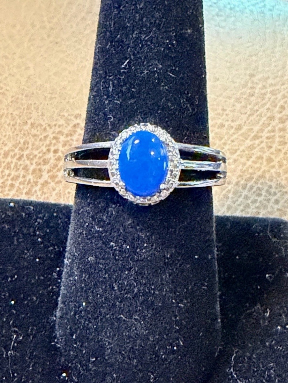 Silver-tone Ring with Blue Chalcedony Oval Cabochon and Halo